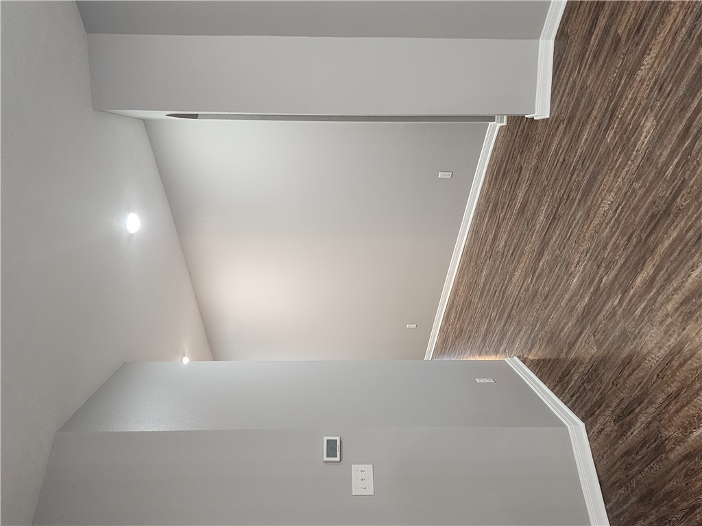 4015 Dunlap Loop College Station, TX 77845 - Photo 4 of 40 a view of an empty room with wooden floor