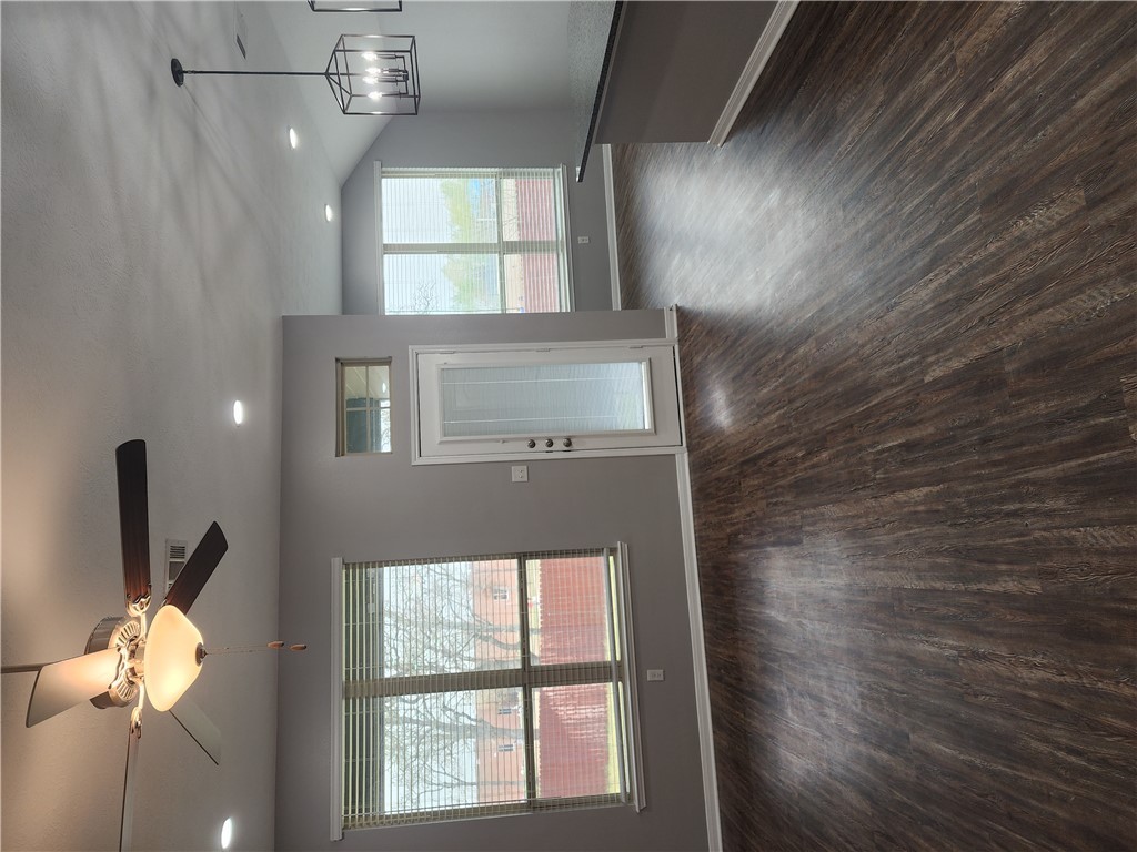 4015 Dunlap Loop College Station, TX 77845 - Photo 8 of 40 a view of an empty room with wooden floor and a window