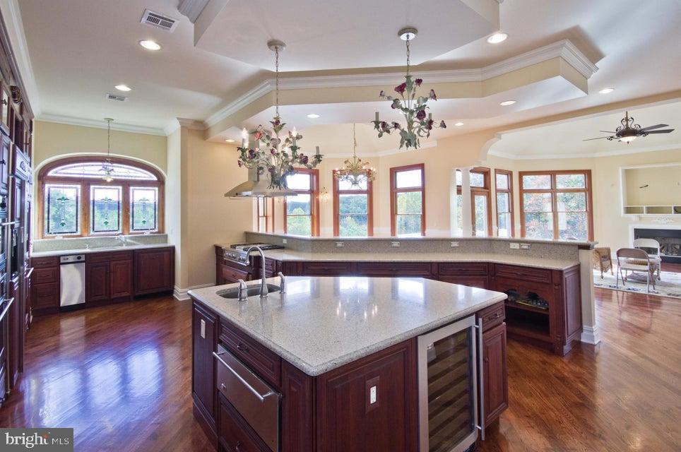 79 Potts Road Robbinsville, NJ 08691 - Photo 11 of 20 an open kitchen with a table and chairs
