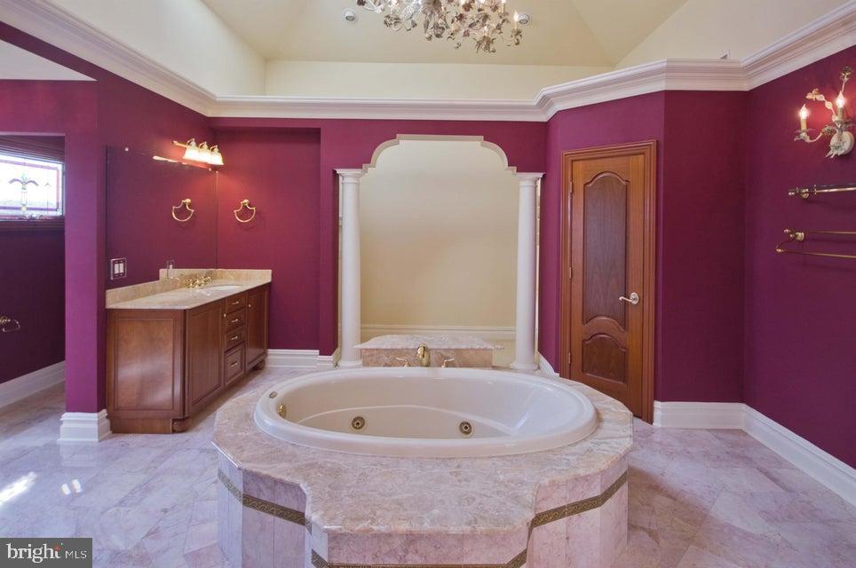 79 Potts Road Robbinsville, NJ 08691 - Photo 14 of 20 a bathroom with a sink and a mirror