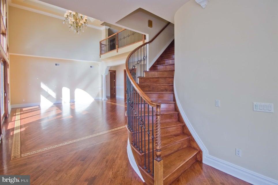 79 Potts Road Robbinsville, NJ 08691 - Photo 5 of 20 a view of entryway with wooden floor
