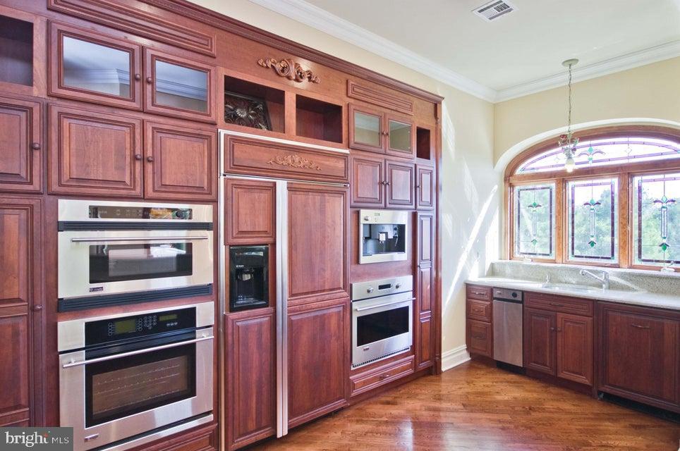 79 Potts Road Robbinsville, NJ 08691 - Photo 9 of 20 a kitchen with stainless steel appliances granite countertop a stove and a refrigerator