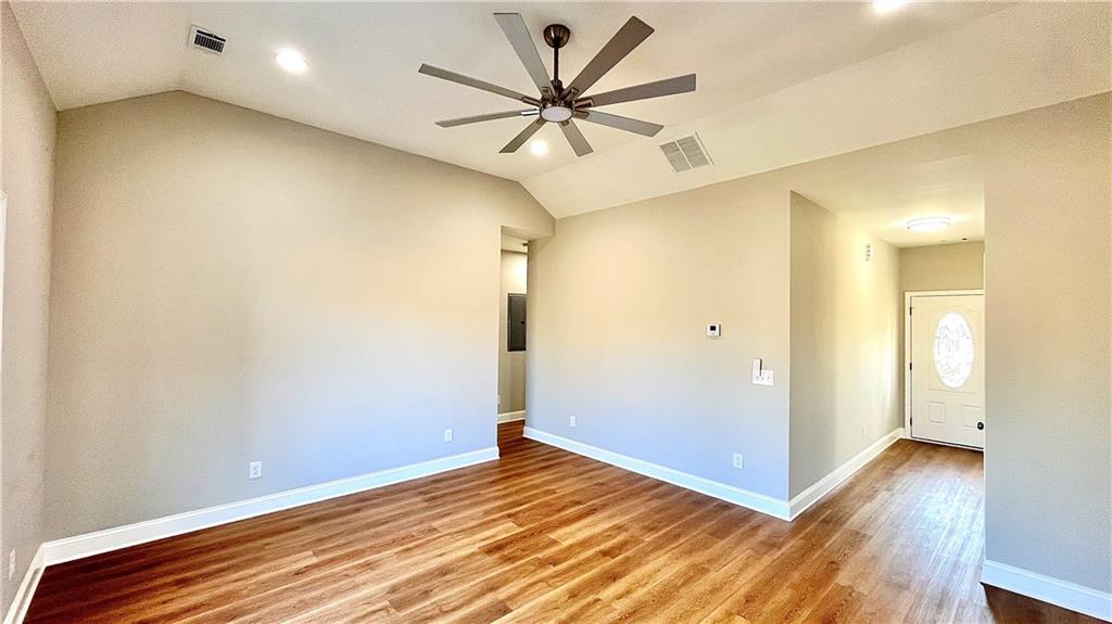 23 S Road Griffin, GA 30224 - Photo 12 of 32 a view of empty room with wooden floor
