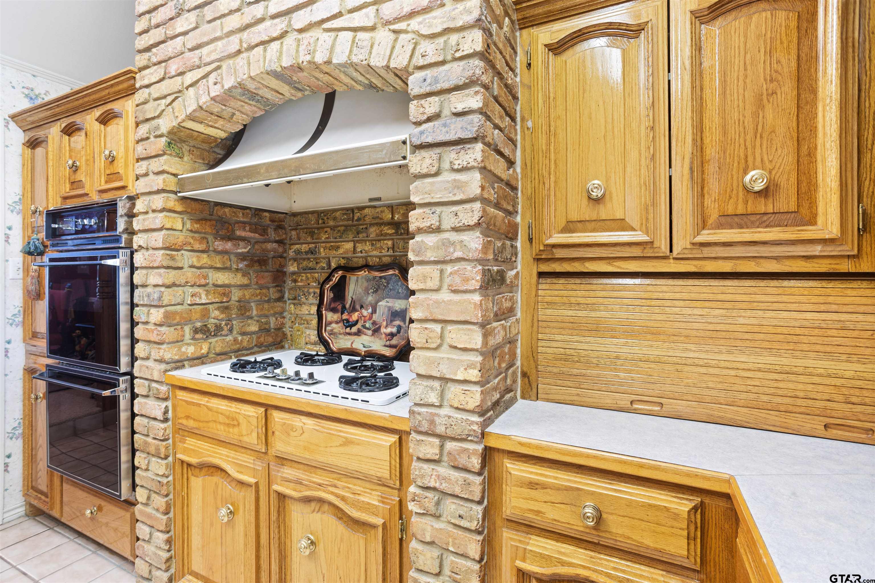 1701 Tall Timber Drive Flint, TX 75762 - Photo 14 of 40 a close view of a sink and a refrigerator