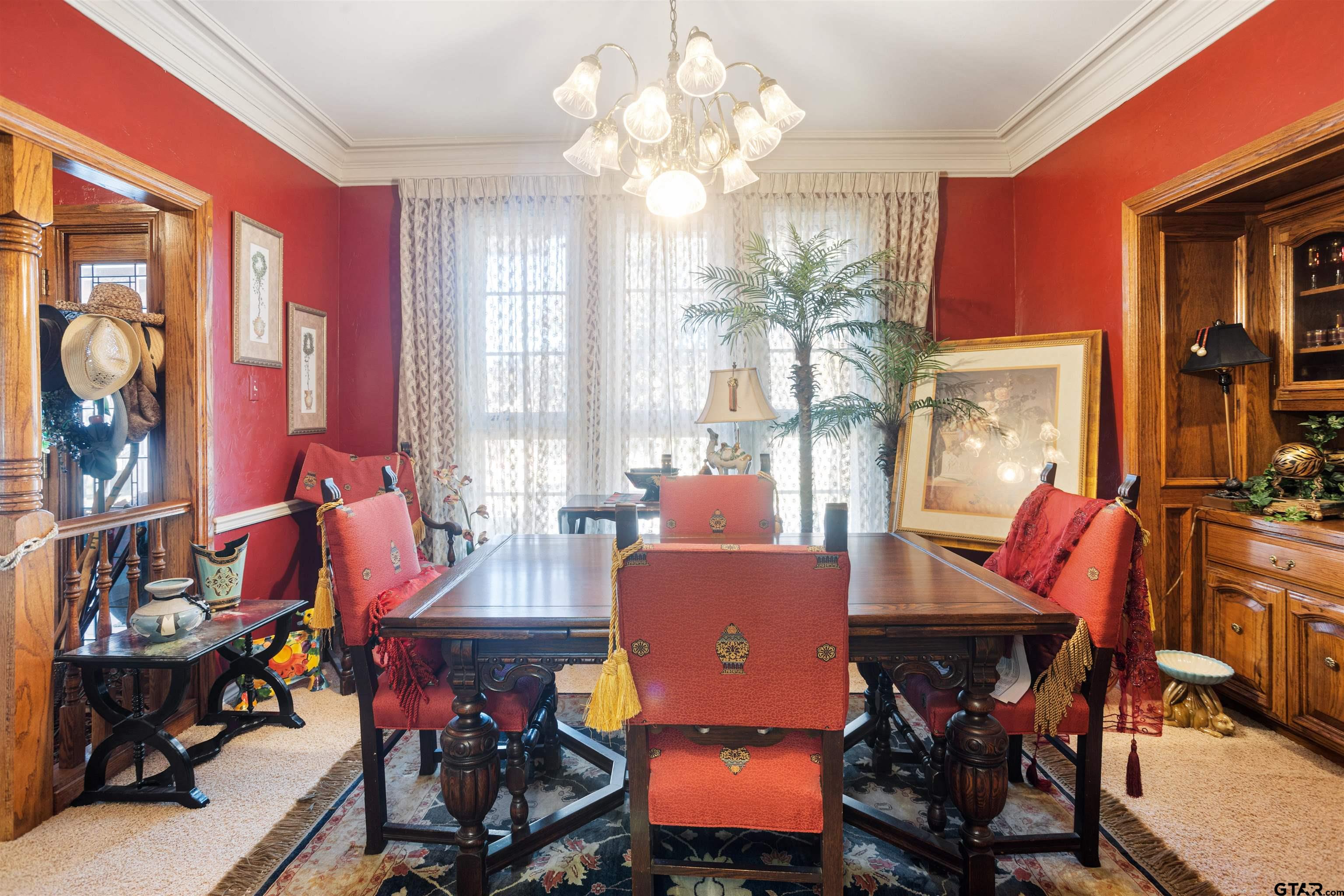 1701 Tall Timber Drive Flint, TX 75762 - Photo 16 of 40 a view of a dining room with furniture and chandelier