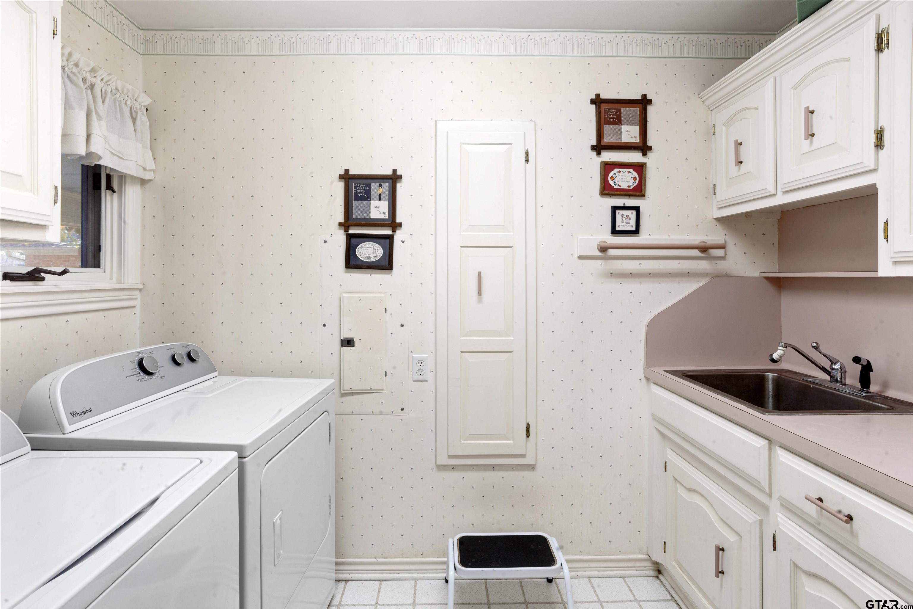 1701 Tall Timber Drive Flint, TX 75762 - Photo 26 of 40 a kitchen with cabinets and appliances