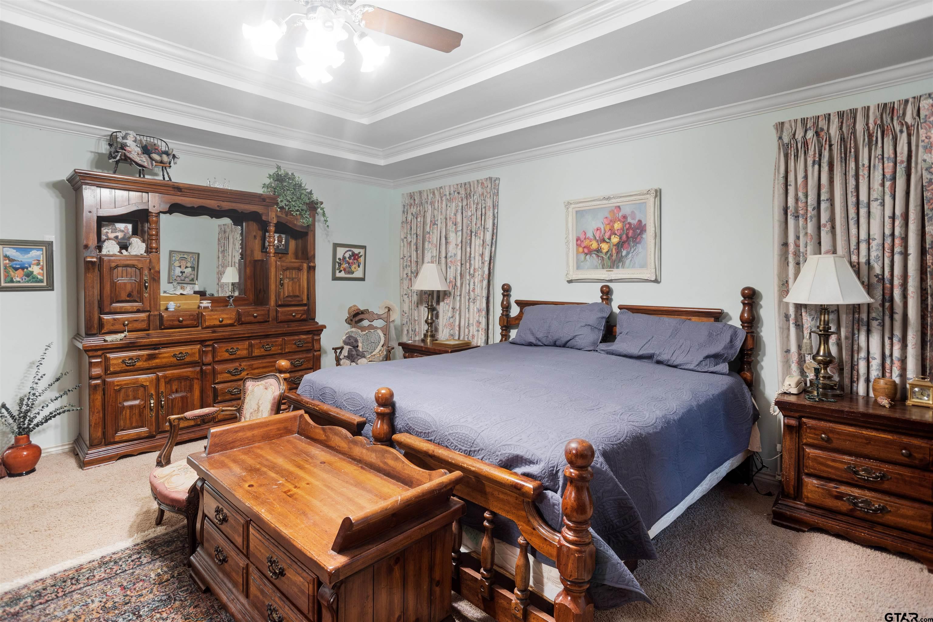 1701 Tall Timber Drive Flint, TX 75762 - Photo 28 of 40 a bed room with a bed and a television