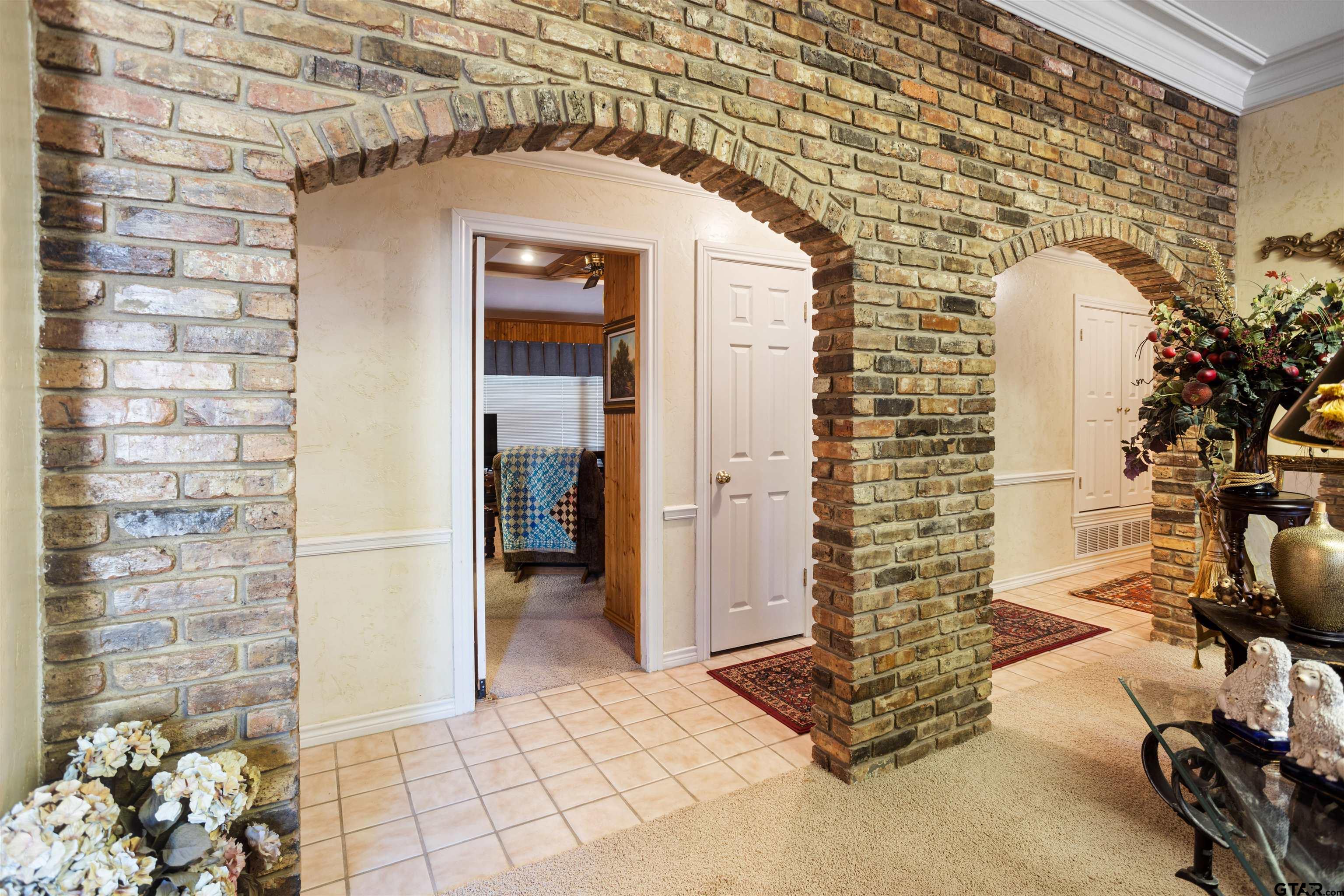 1701 Tall Timber Drive Flint, TX 75762 - Photo 4 of 40 a view of entryway with a front door and wooden floor