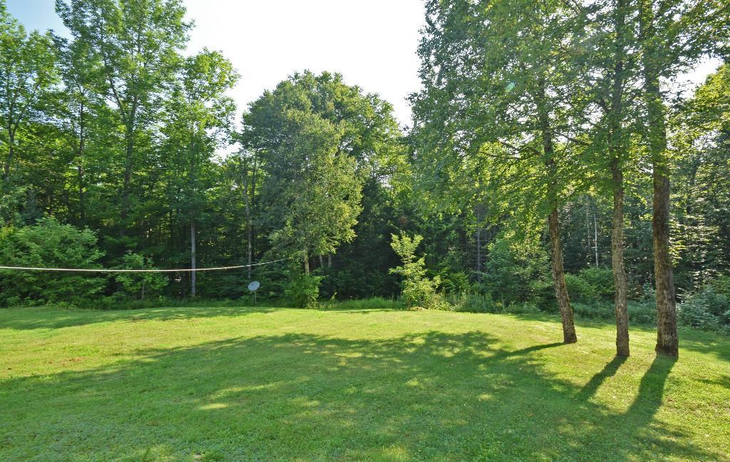 480 Bunker Hill Road Lagrange, ME 04453 - Photo 20 of 23 Side yard with dog run