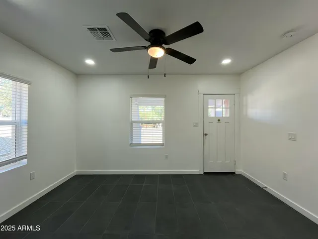 a view of a back yard of the house