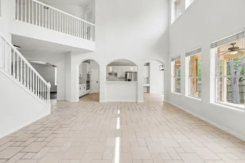 a view of a living room with entryway