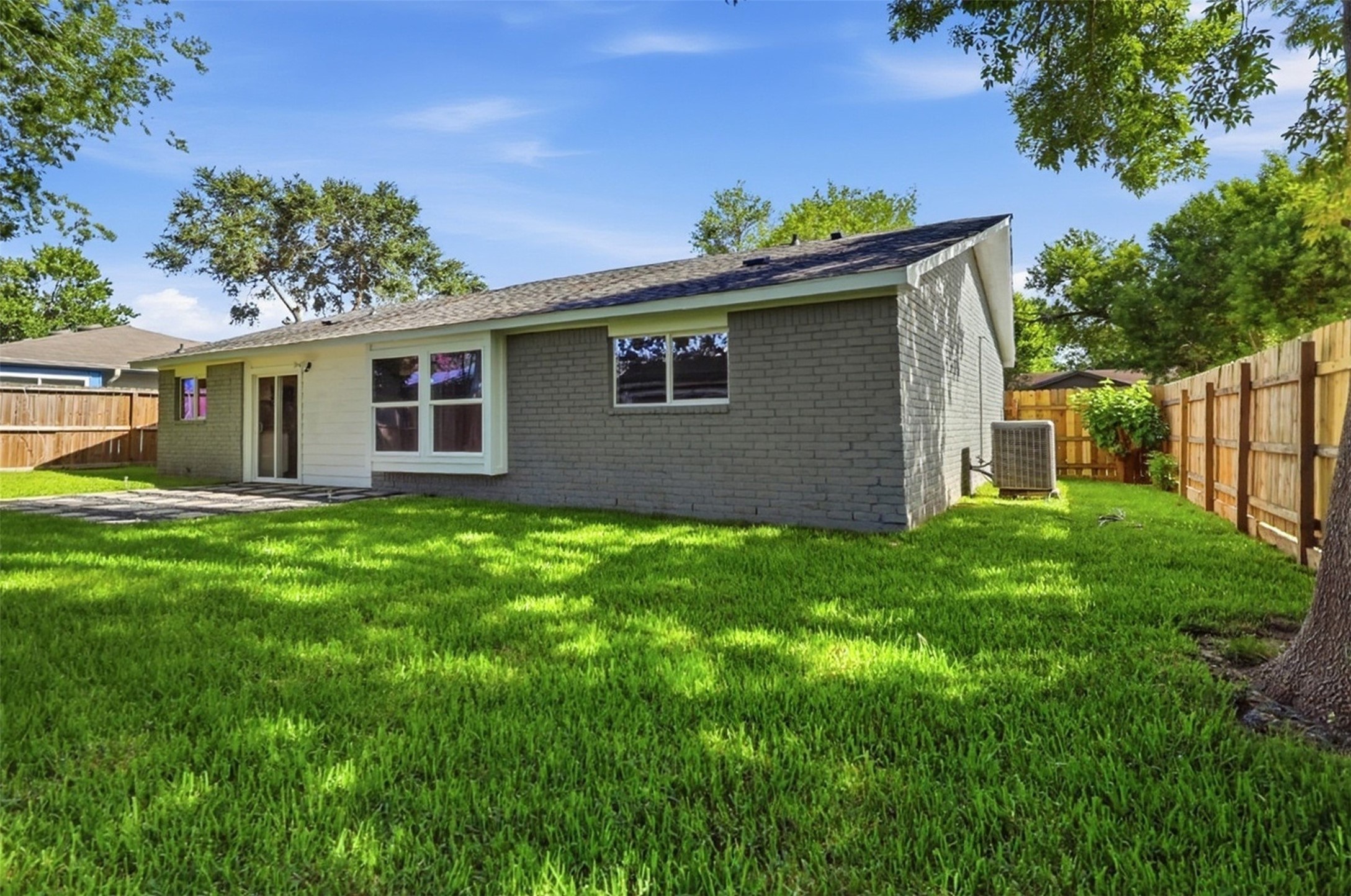 4767 Beechaven Street Houston, TX 77053 - Photo 3 of 26 a view of a house with a yard
