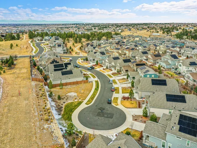 a picture of a room with a white wall and a large window