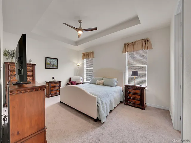 a bedroom with a bed and furniture