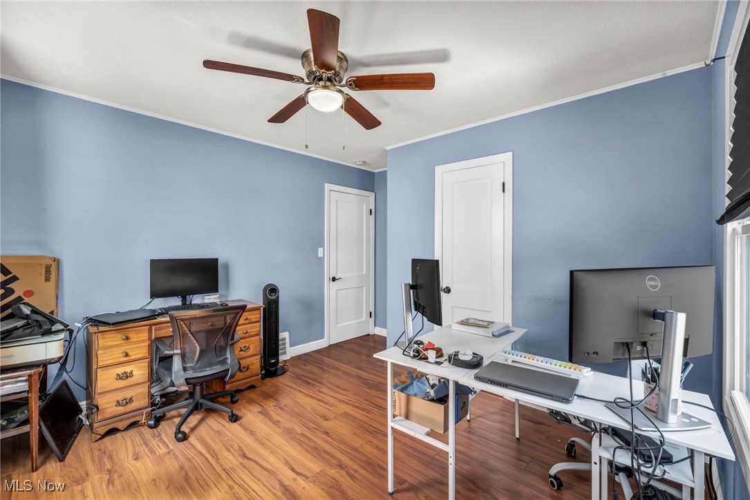 21100 Watson Road Maple Heights, OH 44137 - Photo 13 of 37 Office area featuring ceiling fan, crown molding, and wood finished floors