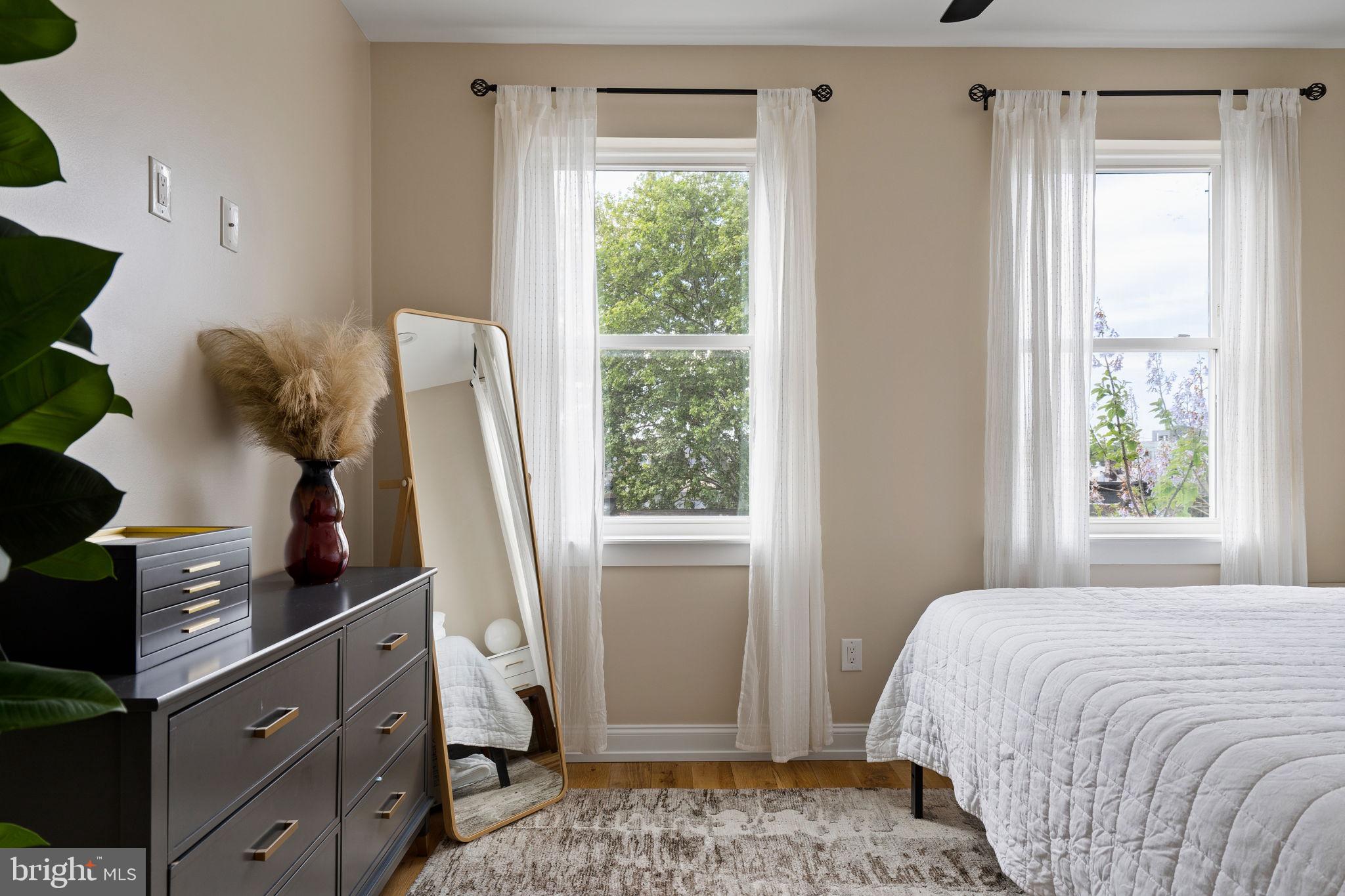 2932 Nicholas Street Philadelphia, PA 19121 - Photo 29 of 65 a bedroom with a bed and a window