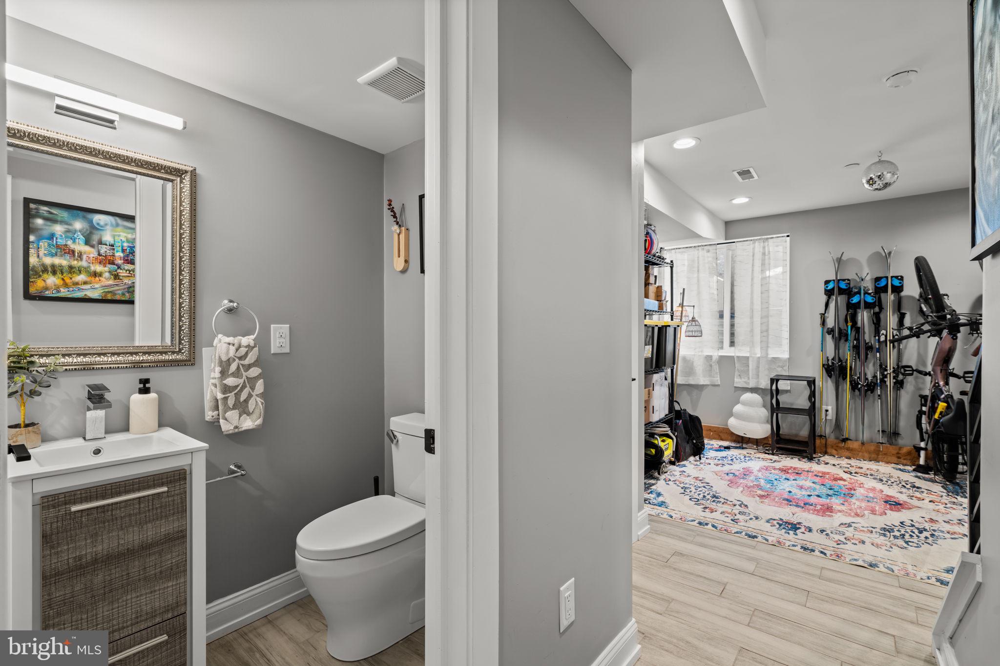 2932 Nicholas Street Philadelphia, PA 19121 - Photo 55 of 65 a bathroom with a sink toilet and shower