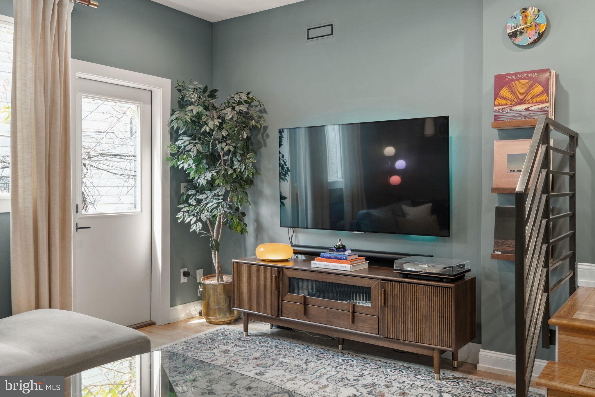 2932 Nicholas Street Philadelphia, PA 19121 - Photo 7 of 65 a room with furniture and flat screen tv