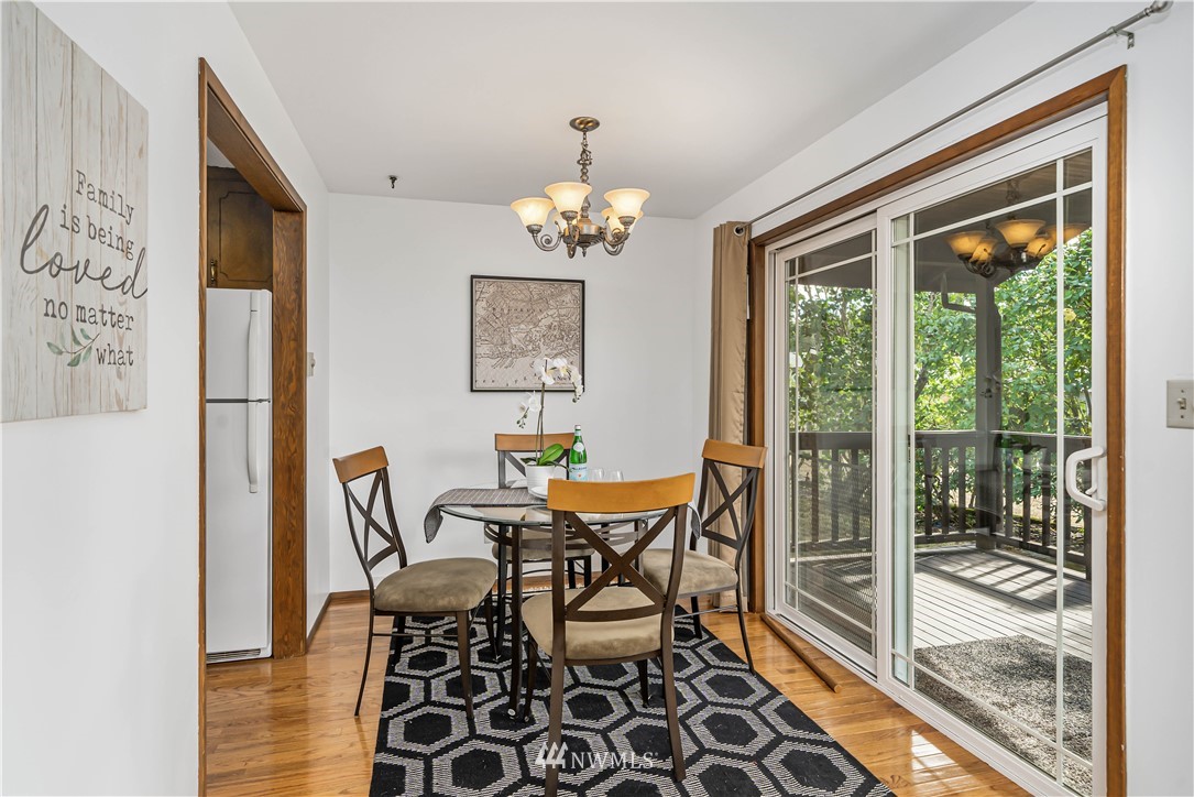 18003 Rhodes Lake Road East Bonney Lake, WA 98391 - Photo 20 of 40 a dining room with furniture and window
