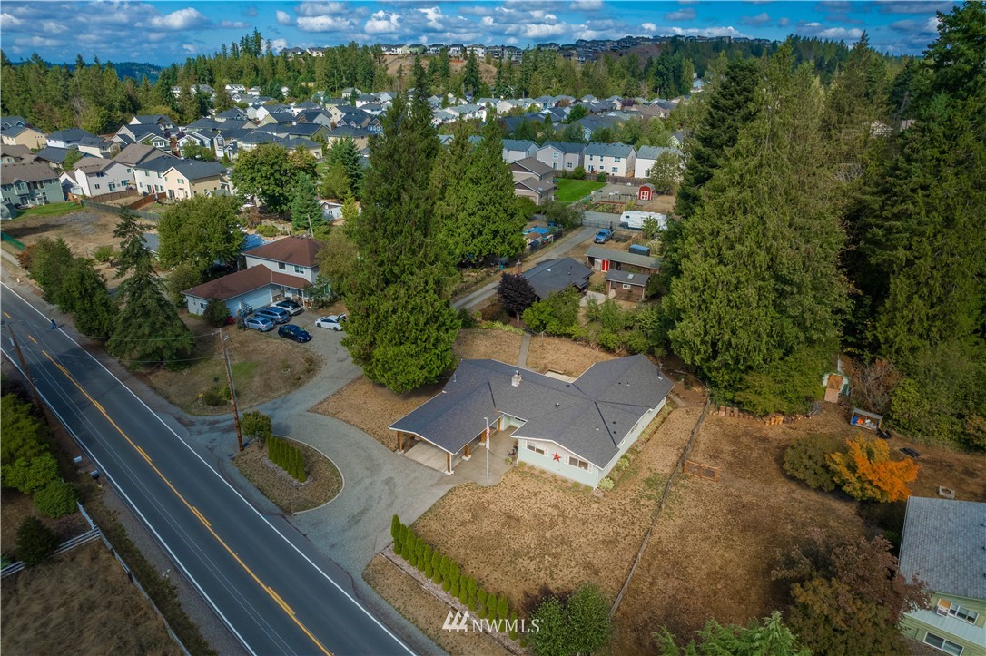 18003 Rhodes Lake Road East Bonney Lake, WA 98391 - Photo 39 of 40 an aerial view of residential houses with outdoor space