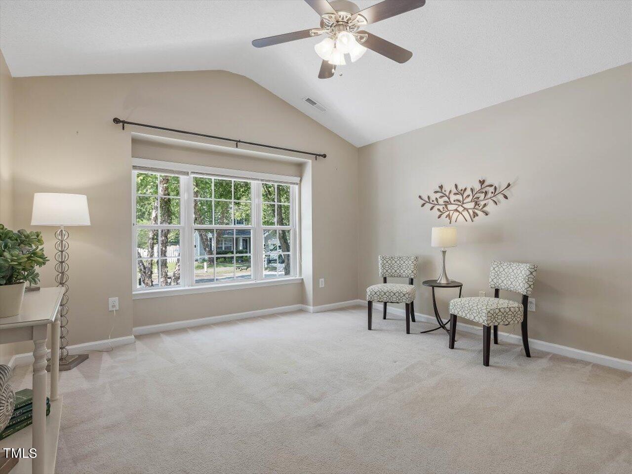 4509 Dolwick Drive Durham, NC 27713 - Photo 15 of 31 a living room with furniture and a large window