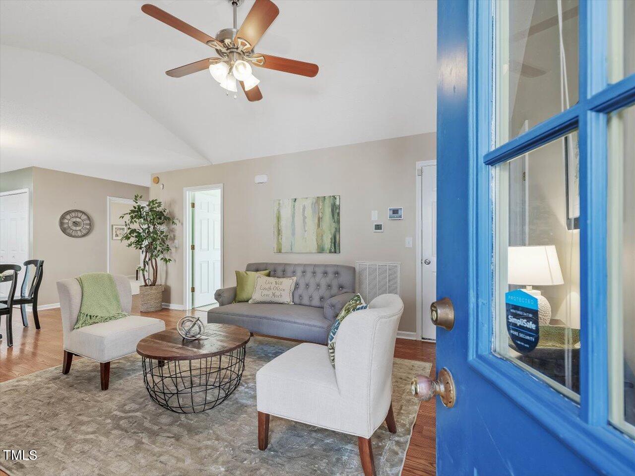 4509 Dolwick Drive Durham, NC 27713 - Photo 4 of 31 a living room with furniture and a large window