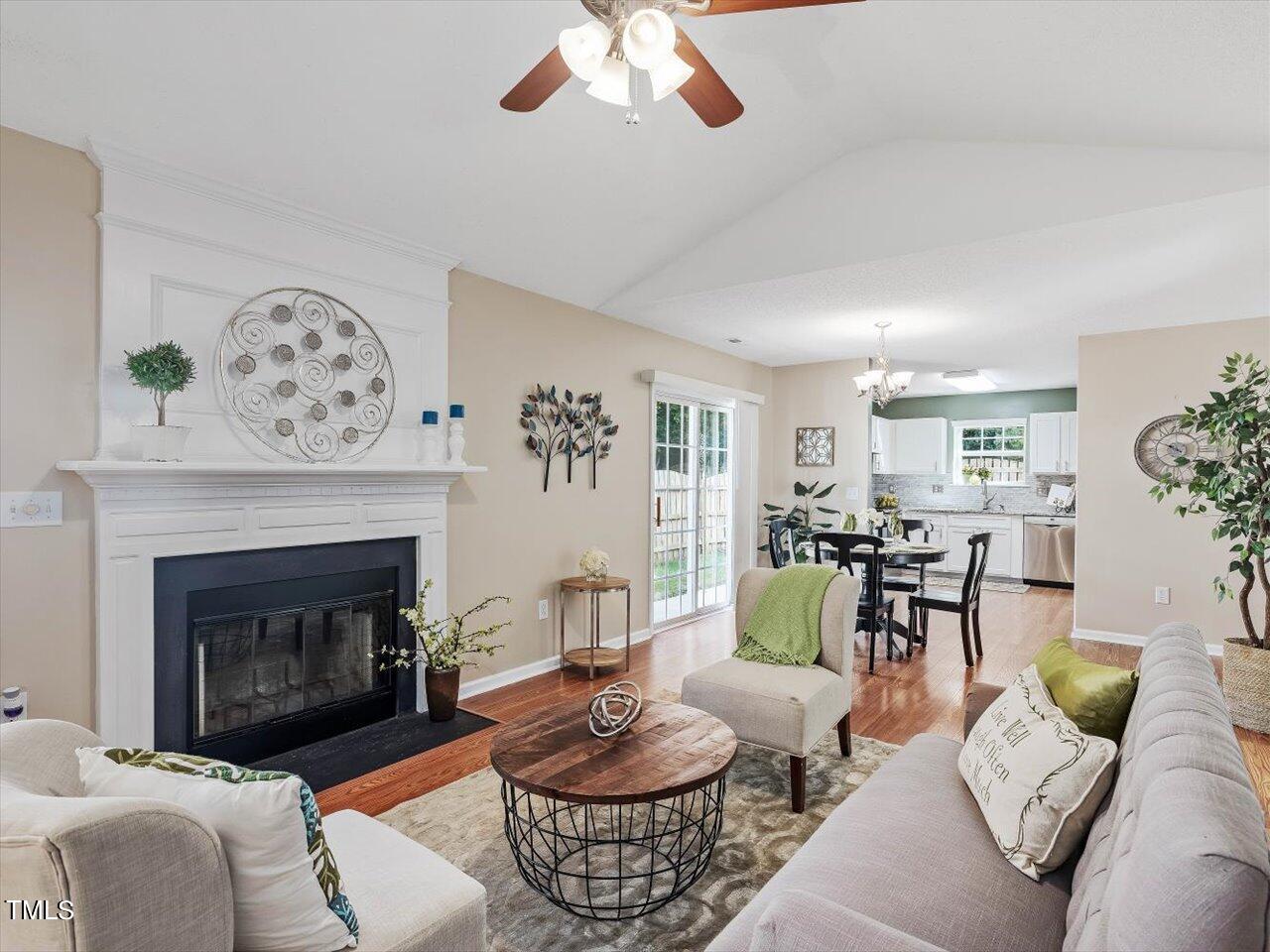 4509 Dolwick Drive Durham, NC 27713 - Photo 5 of 31 a living room with furniture and a fireplace