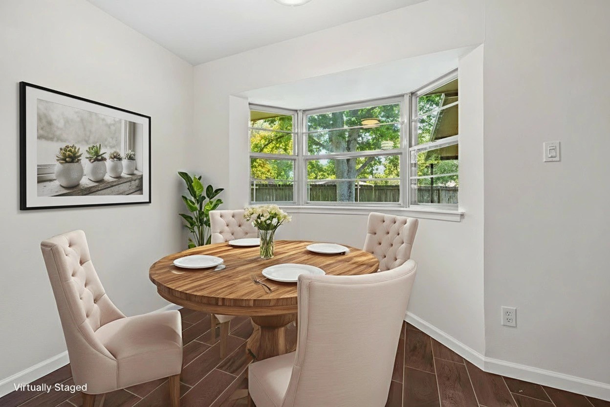 3930 Tumbleweed Lane Baytown, TX 77521 - Photo 8 of 23 a dining room with furniture and window