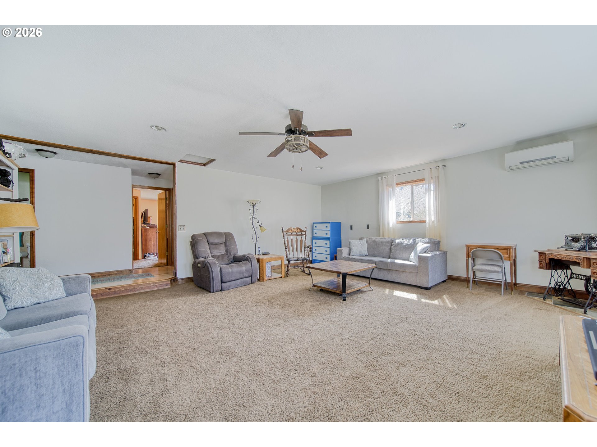 52320 Southwest Taylor Street Scappoose, OR 97056 - Photo 20 of 48 a living room with furniture and a chandelier