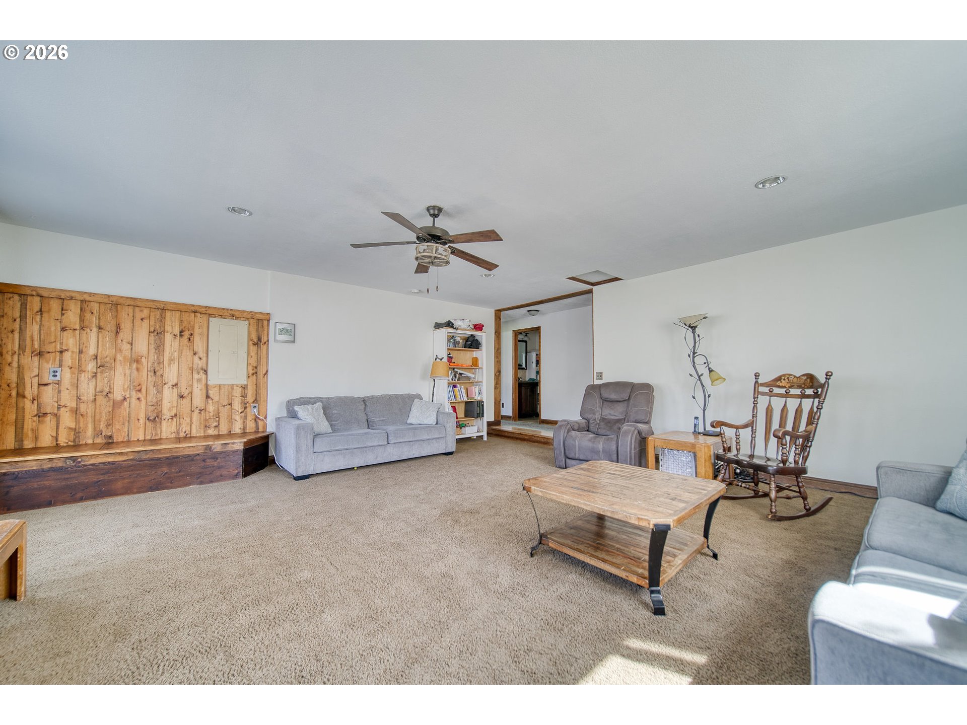 52320 Southwest Taylor Street Scappoose, OR 97056 - Photo 21 of 48 a living room with furniture and a large window