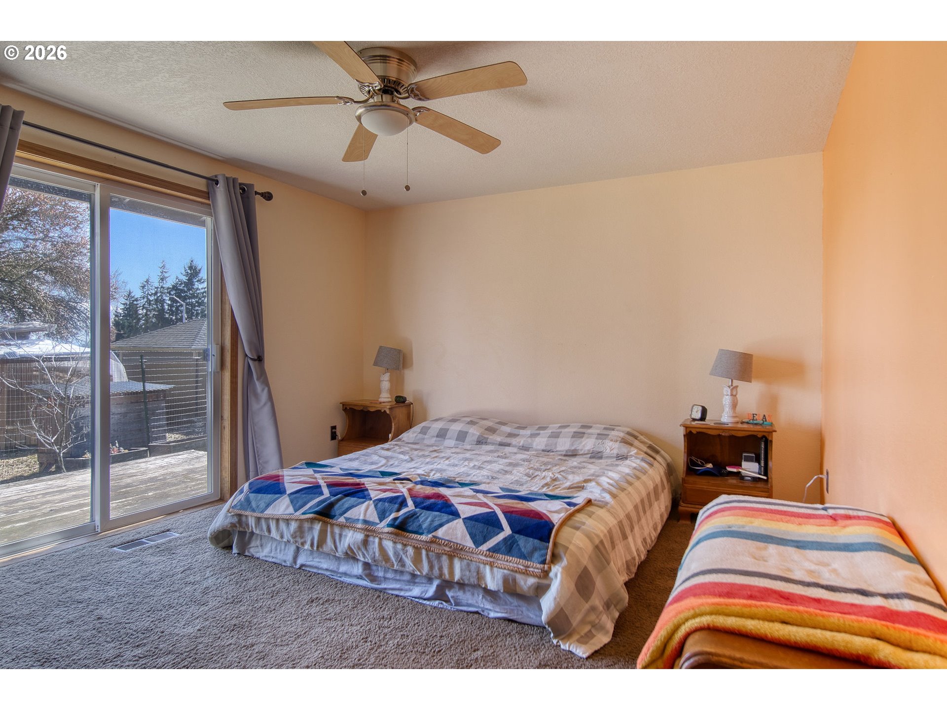 52320 Southwest Taylor Street Scappoose, OR 97056 - Photo 23 of 48 a bedroom with a bed and wooden floor