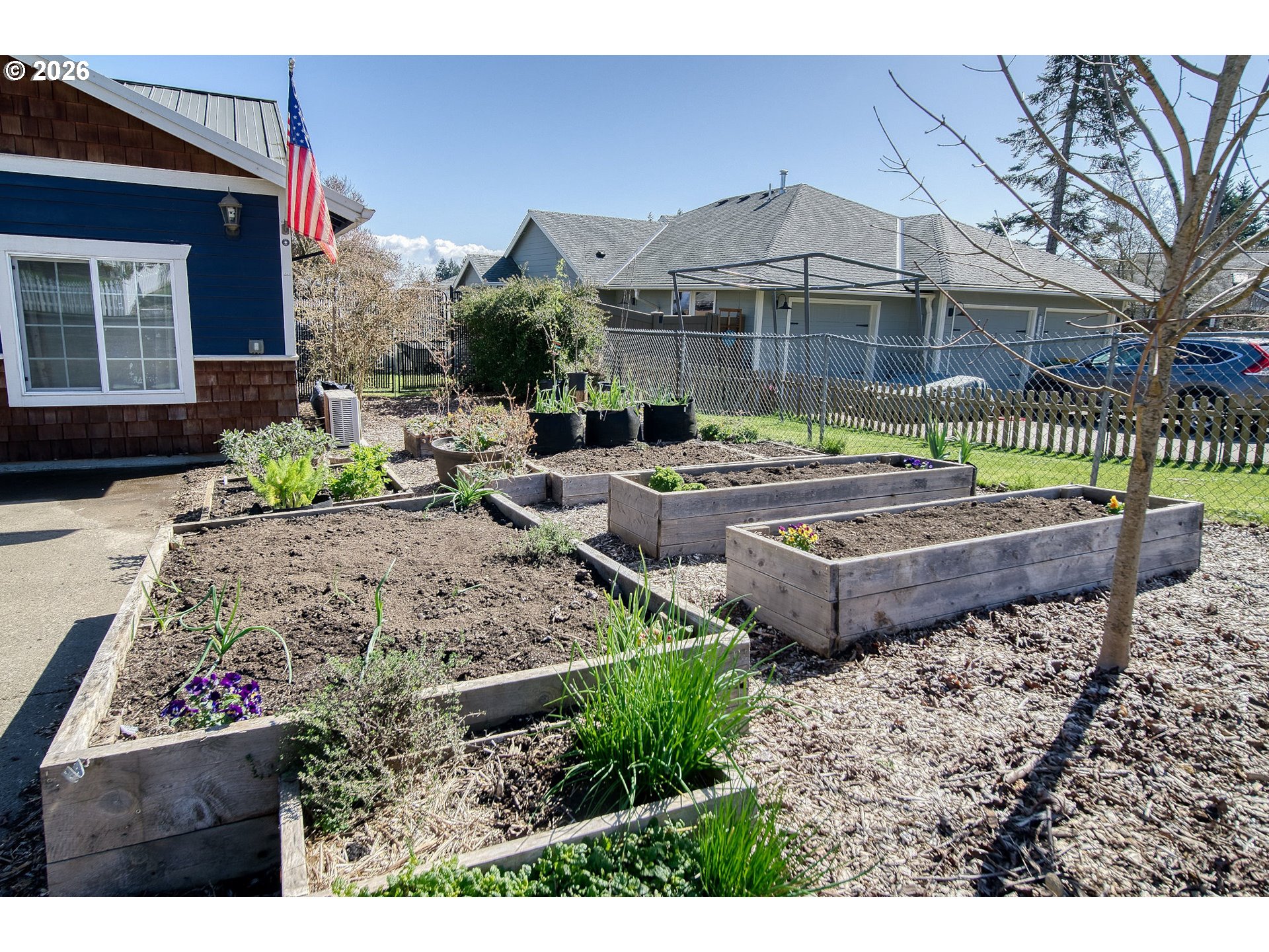 52320 Southwest Taylor Street Scappoose, OR 97056 - Photo 28 of 48 a front view of a house with garden