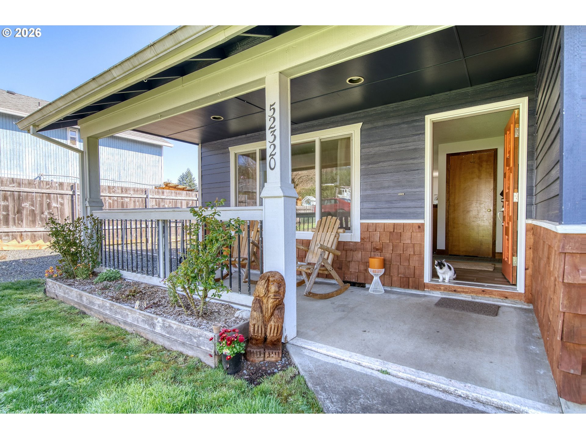 52320 Southwest Taylor Street Scappoose, OR 97056 - Photo 3 of 48 a backyard of a house with yard and outdoor seating