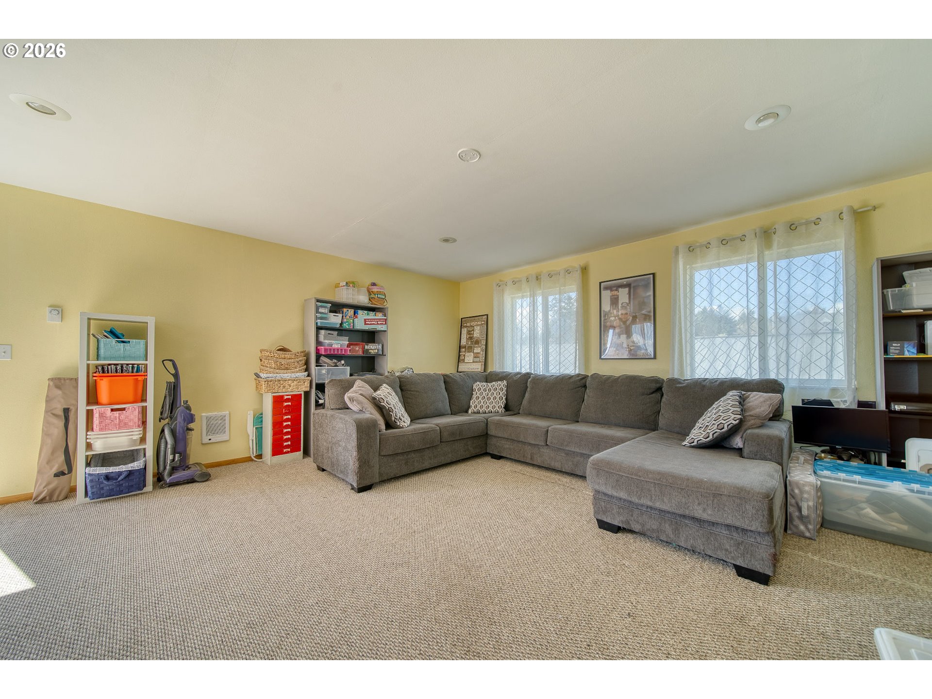 52320 Southwest Taylor Street Scappoose, OR 97056 - Photo 40 of 48 a living room with furniture and a flat screen tv