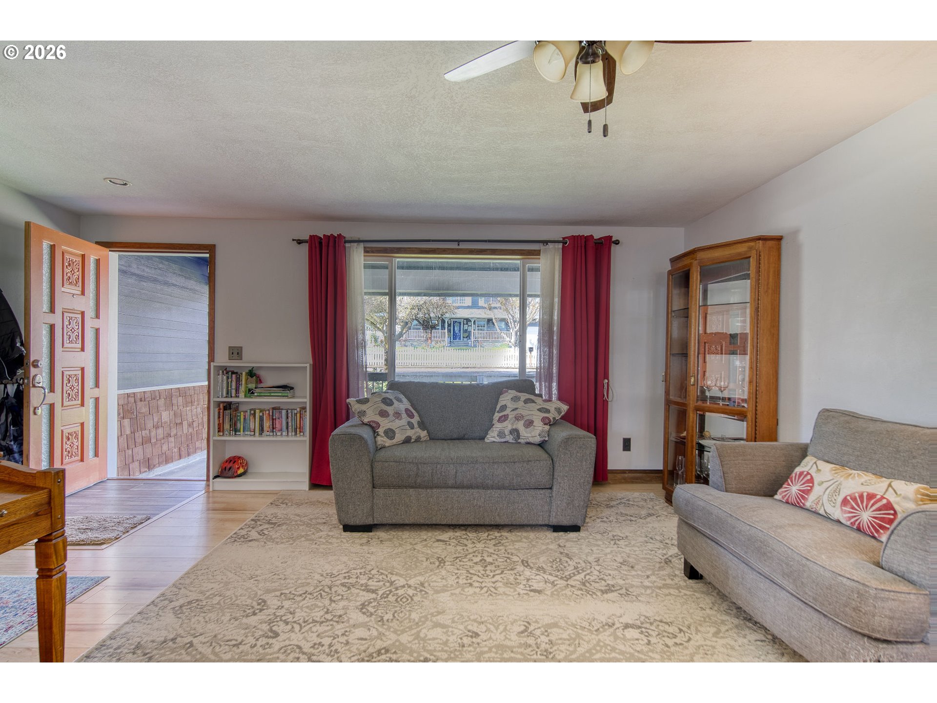 52320 Southwest Taylor Street Scappoose, OR 97056 - Photo 5 of 48 a living room with furniture and a flat screen tv