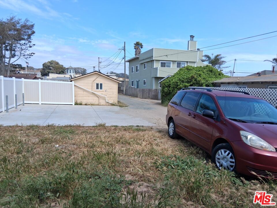 370 Pier Avenue Oceano, CA 93445 - Photo 5 of 9 a car parked in front of a house