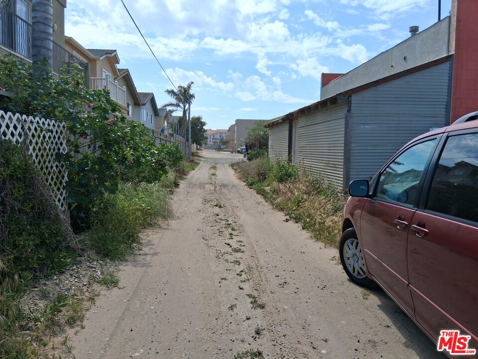 370 Pier Avenue Oceano, CA 93445 - Photo 7 of 9 a backyard of a house with lots of green space