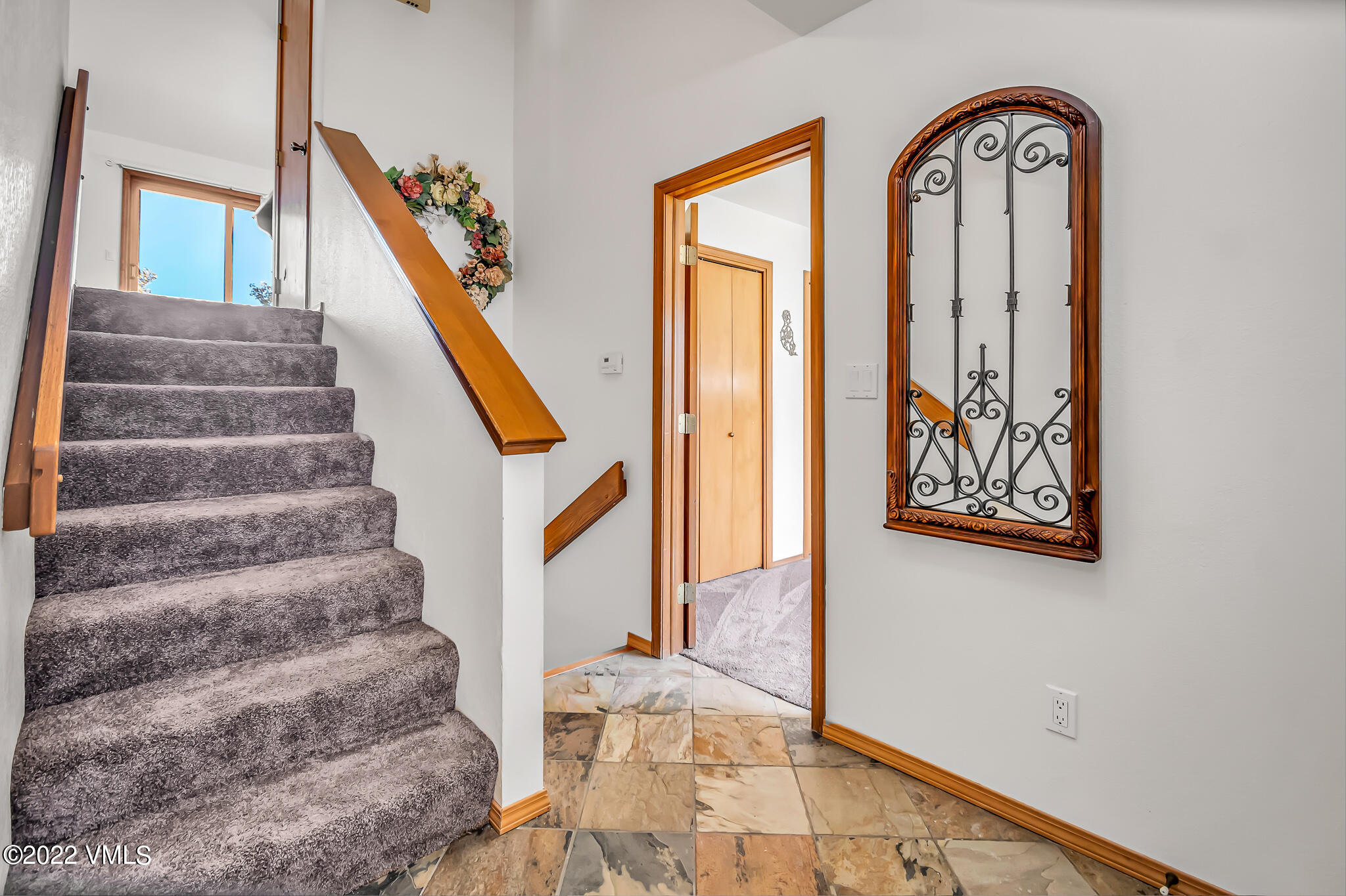 155 Meile Lane Edwards, CO 81632 - Photo 14 of 26 a view of staircase with two black and white walls