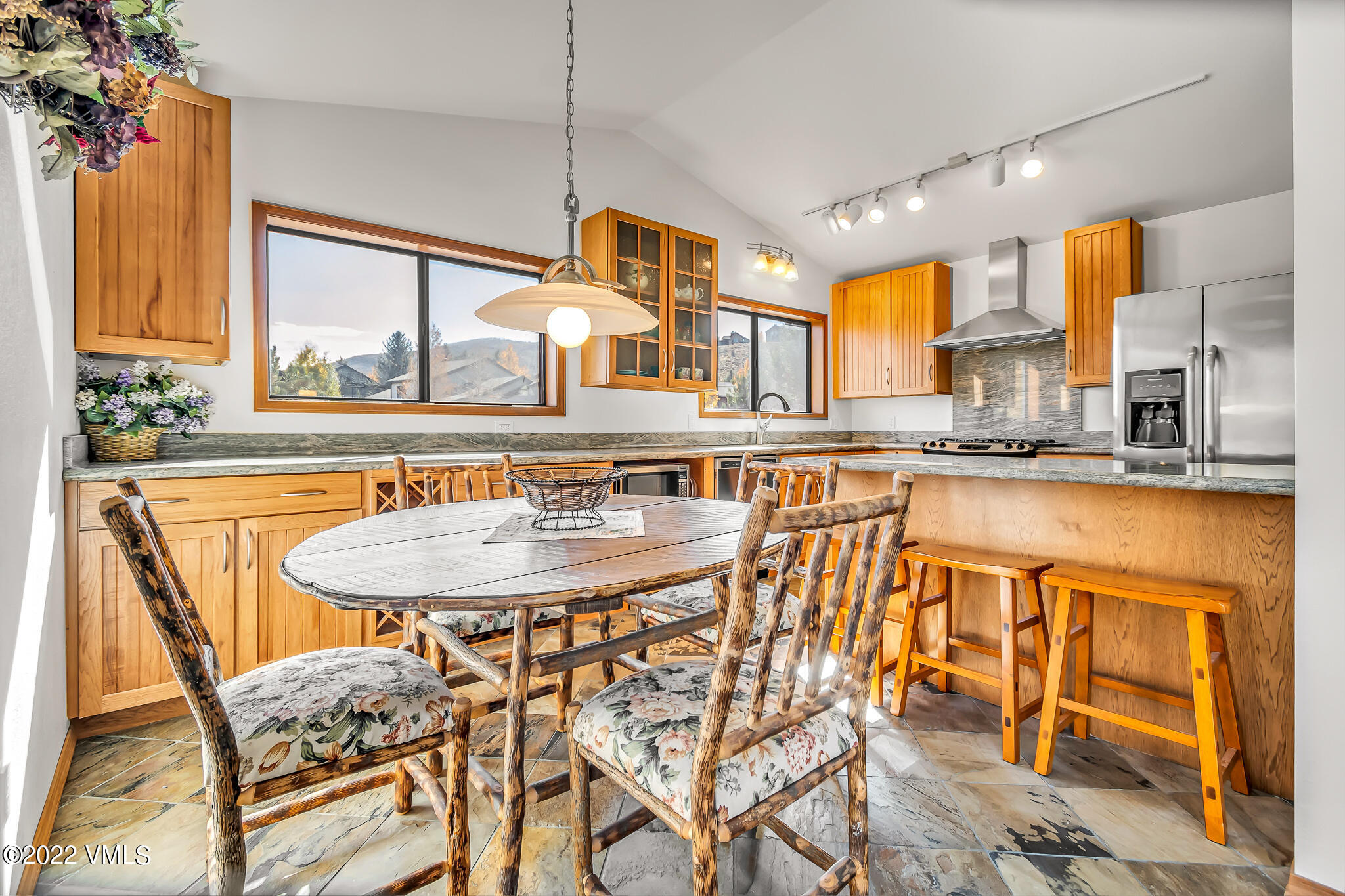 155 Meile Lane Edwards, CO 81632 - Photo 16 of 26 a dining table chairs next to a window