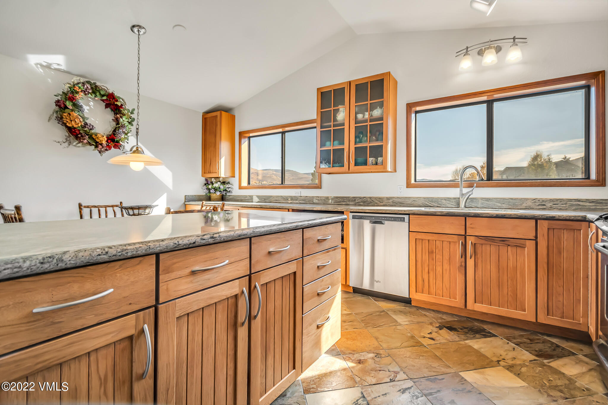 155 Meile Lane Edwards, CO 81632 - Photo 17 of 26 a kitchen with granite countertop a sink and cabinets