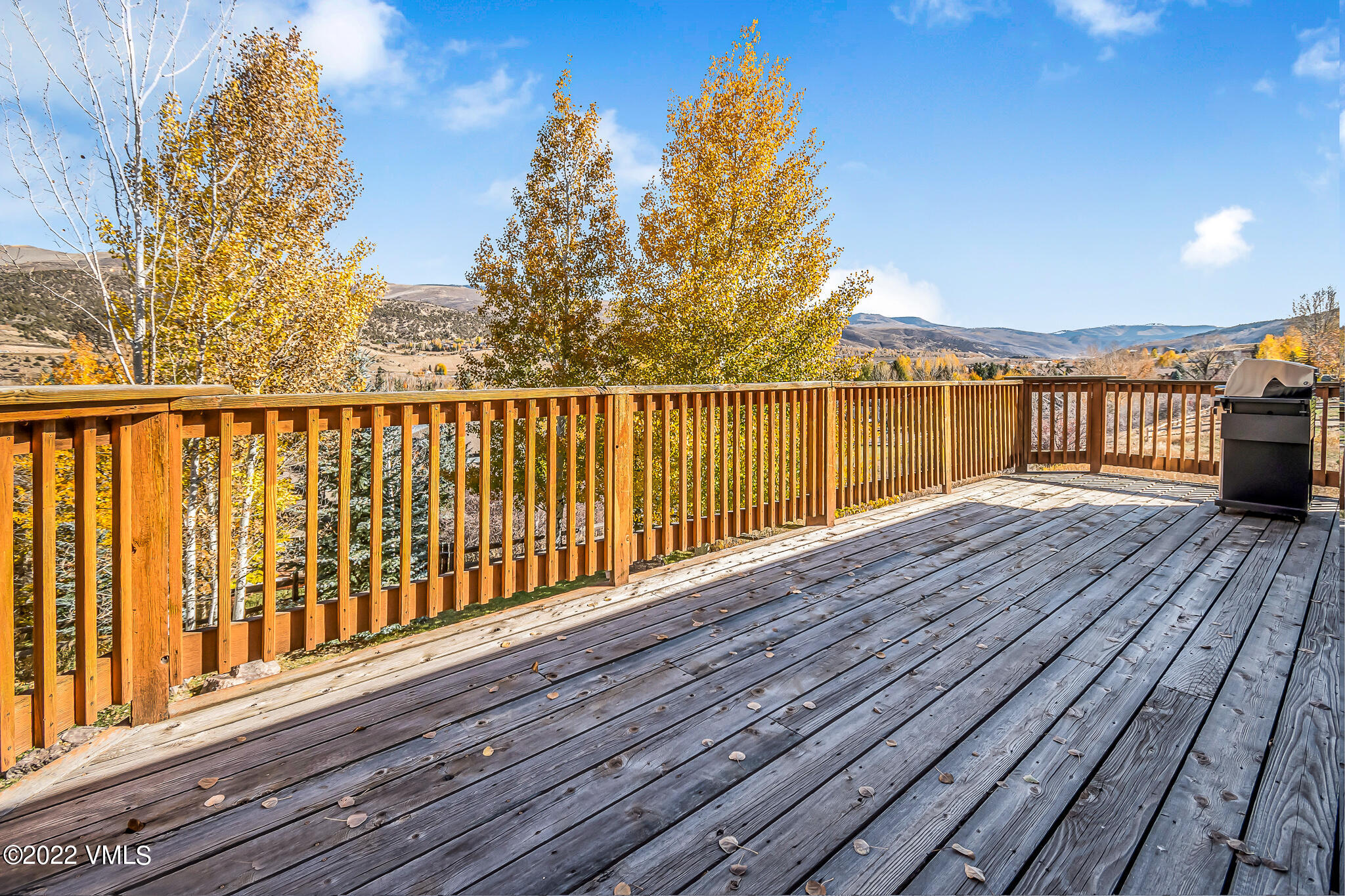 155 Meile Lane Edwards, CO 81632 - Photo 18 of 26 a balcony with wooden floor and yard