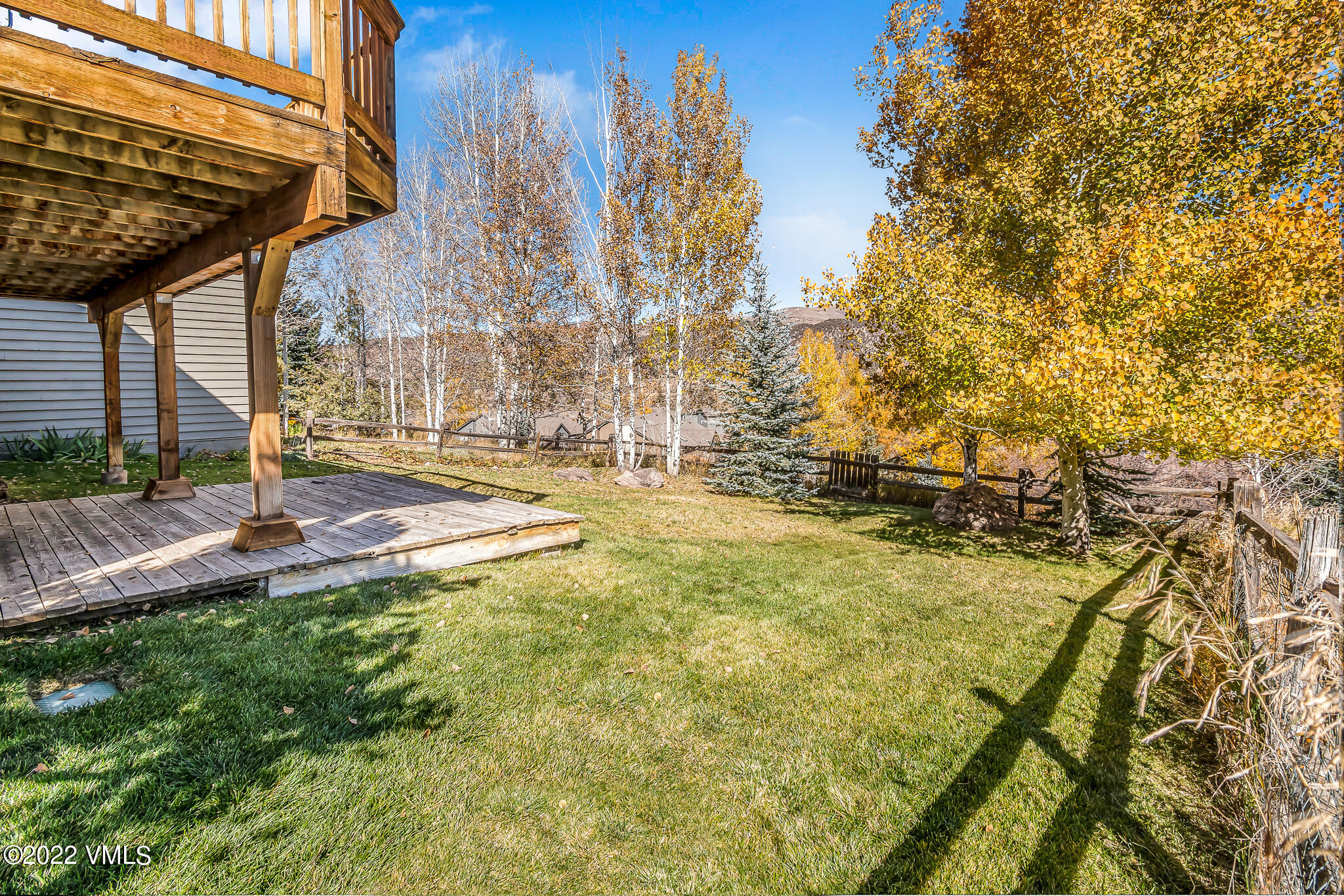 155 Meile Lane Edwards, CO 81632 - Photo 20 of 26 a backyard of a house with table and chairs