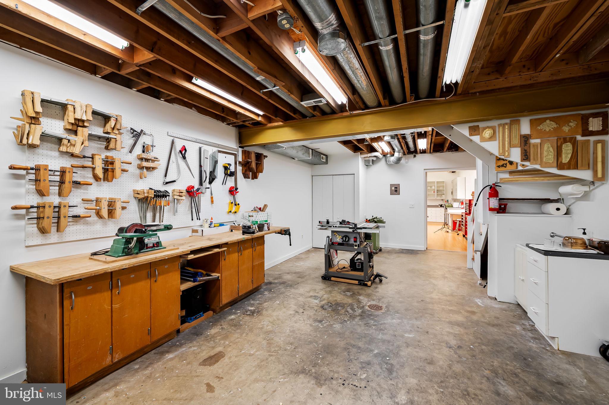 1637 East Baltimore Street Baltimore, MD 21231 - Photo 12 of 39 a kitchen with a sink a stove and cabinets