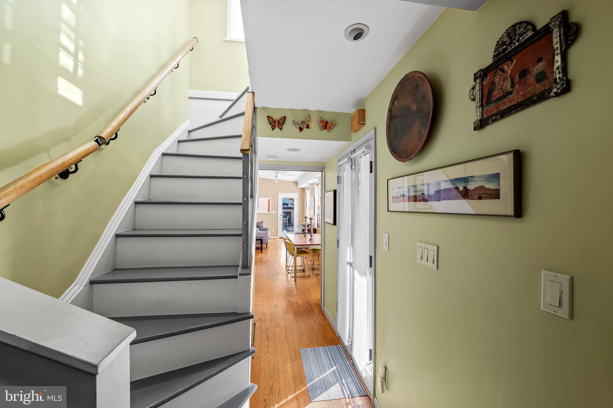 1637 East Baltimore Street Baltimore, MD 21231 - Photo 17 of 39 a view of a hallway with wooden floor and entryway