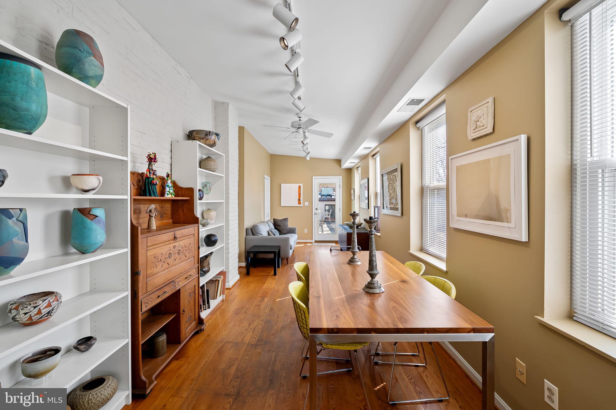 1637 East Baltimore Street Baltimore, MD 21231 - Photo 25 of 39 a view of a dining room with furniture and a window