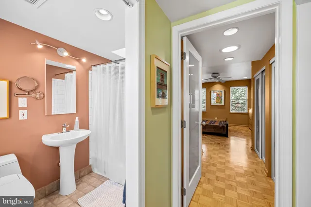 a bathroom with a sink and mirror