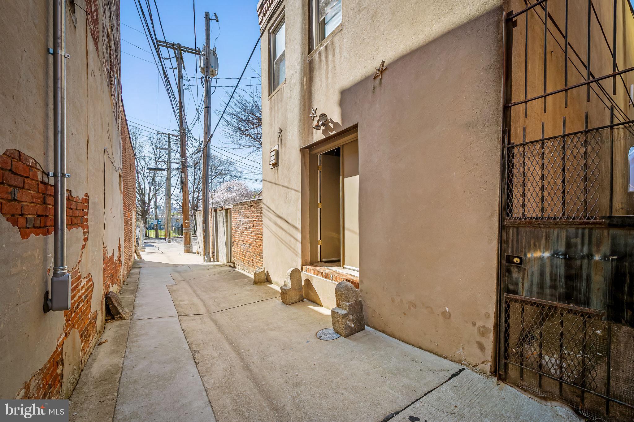 1637 East Baltimore Street Baltimore, MD 21231 - Photo 39 of 39 a view of a brick house with many windows