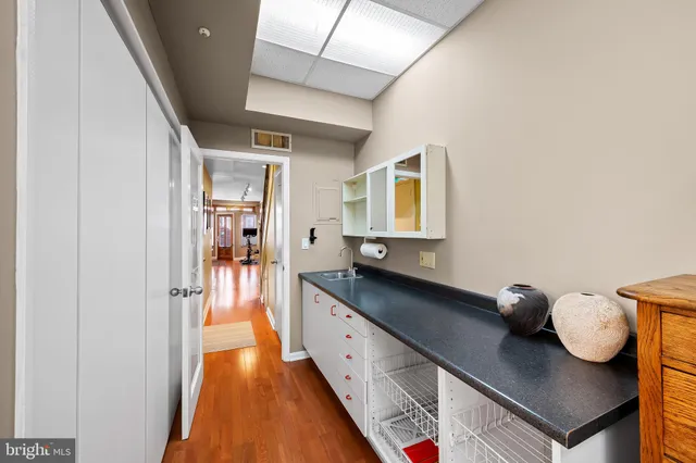 a hallway with view of living room