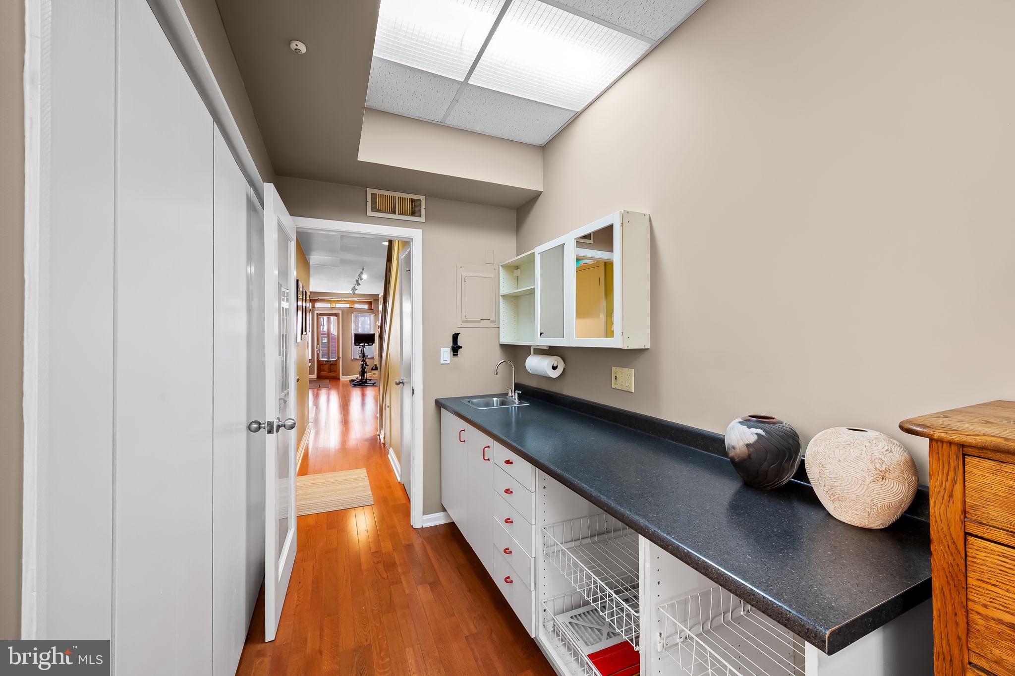 1637 East Baltimore Street Baltimore, MD 21231 - Photo 6 of 39 a hallway with view of living room