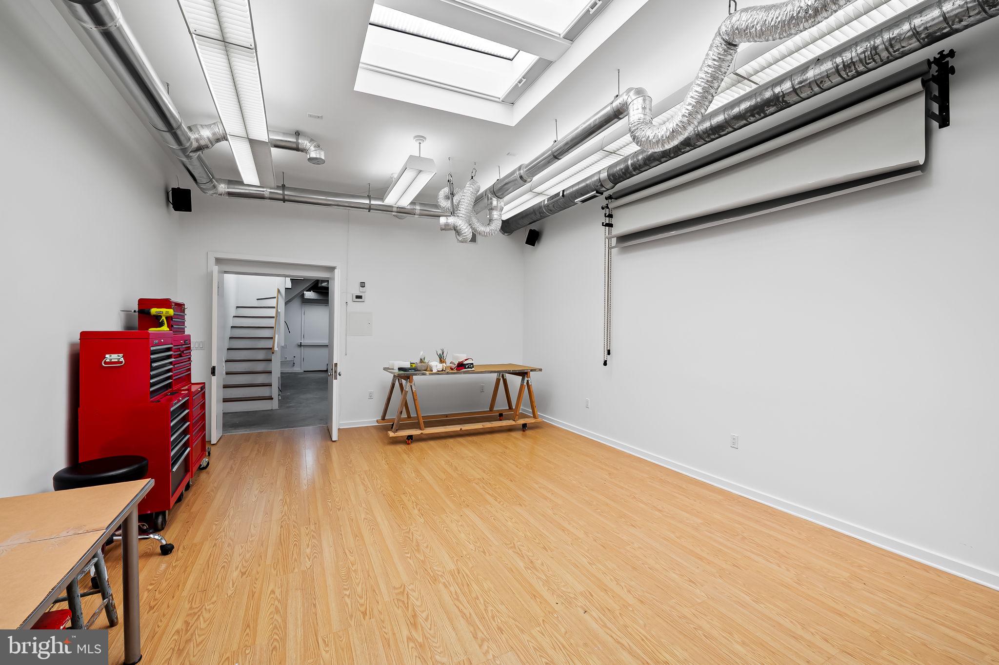 1637 East Baltimore Street Baltimore, MD 21231 - Photo 8 of 39 a view of a room with gym equipment